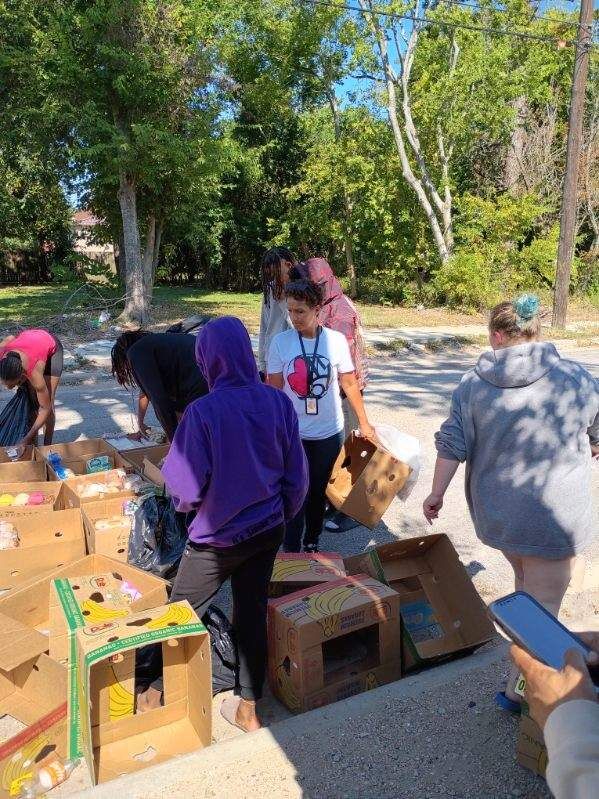 Community members gathered during a park outreach